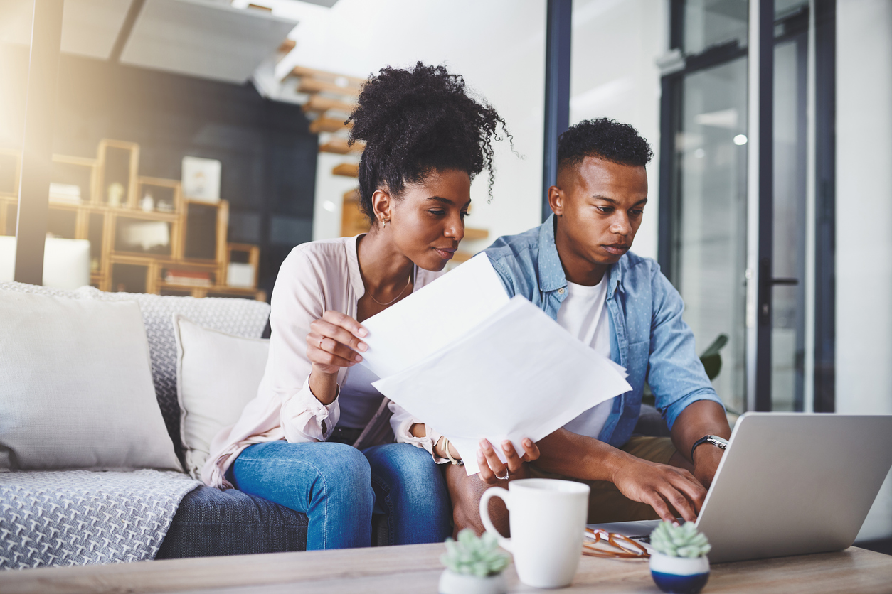 couple updating their budget for recession